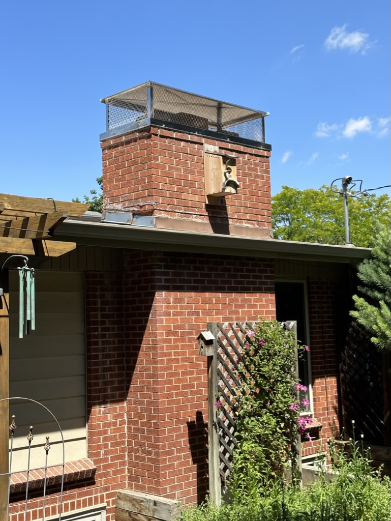Brick chimney with cap installed by Tru Duct Cleaning